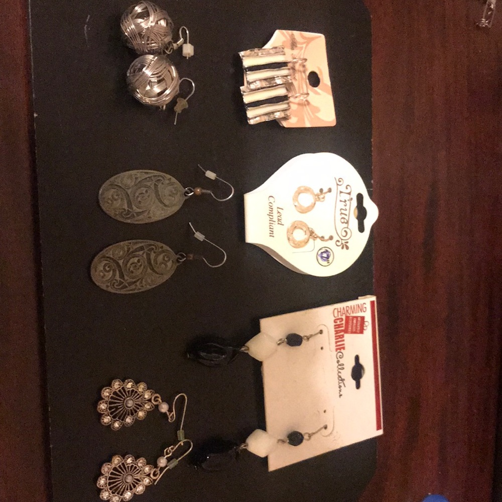 Six pairs of pierced earrings